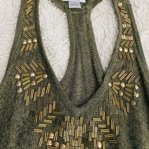 Cache racer back tank with gold embellishments.